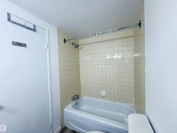 Bathroom with tub / shower combination and toilet - 