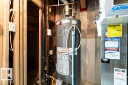 Utilities with gas water heater and heating unit - 