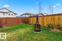 View of fenced backyard - 