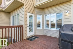 Wooden deck featuring grilling area - 