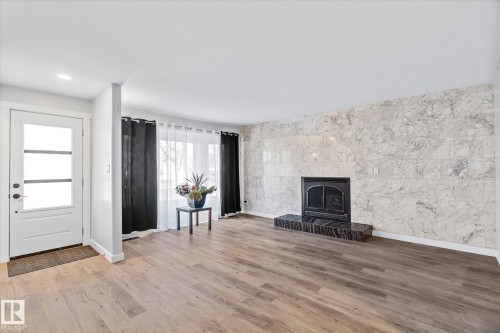 67 Arlington Drive, St. Albert, AB - Indoor Photo Showing Living Room With Fireplace