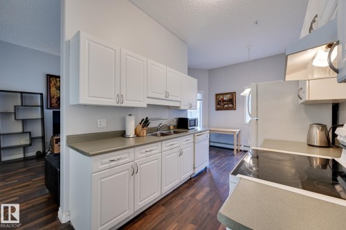 107 11446 40 Avenue, Edmonton, AB - Indoor Photo Showing Kitchen With Double Sink
