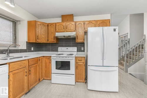 14523 32 Street, Edmonton, AB - Indoor Photo Showing Kitchen With Double Sink