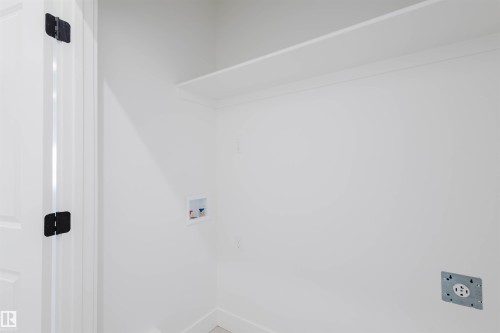 335 Bluff Cove, Leduc, AB - Indoor Photo Showing Other Room