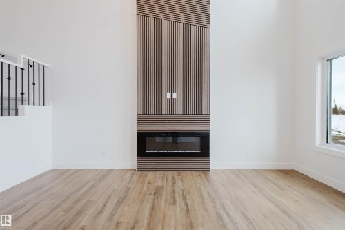 335 Bluff Cove, Leduc, AB - Indoor With Fireplace