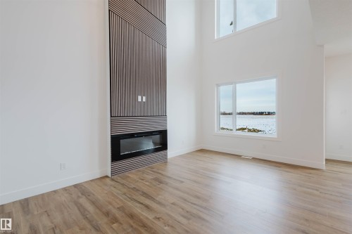 335 Bluff Cove, Leduc, AB - Indoor With Fireplace