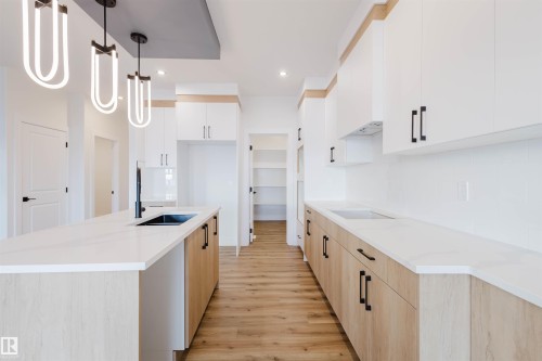 367 Bluff Cove, Leduc, AB - Indoor Photo Showing Kitchen With Upgraded Kitchen