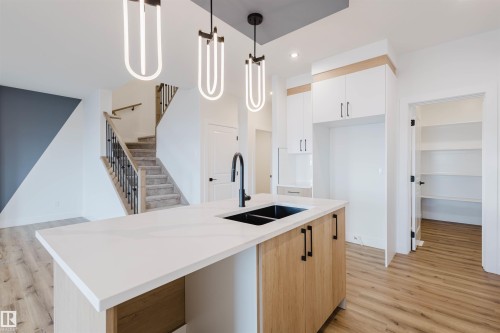 367 Bluff Cove, Leduc, AB - Indoor Photo Showing Kitchen With Double Sink