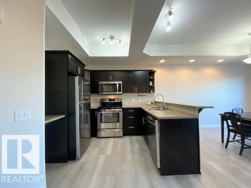 B 4706 57 Avenue, Wetaskiwin, AB - Indoor Photo Showing Kitchen With Double Sink