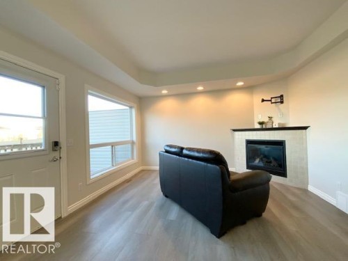 B 4706 57 Avenue, Wetaskiwin, AB - Indoor With Fireplace