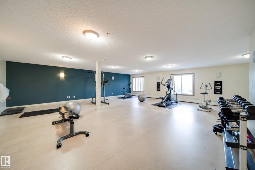 115 4403 23 Street, Edmonton, AB - Indoor Photo Showing Gym Room