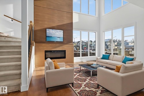 1 Elwyck Gate, Spruce Grove, AB - Indoor Photo Showing Living Room With Fireplace