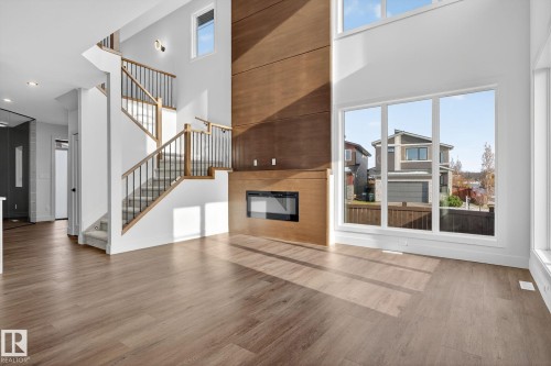 1 Elwyck Gate, Spruce Grove, AB - Indoor Photo Showing Other Room With Fireplace