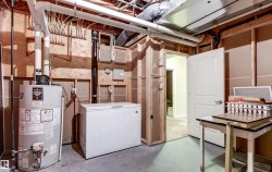 Unfinished below grade area with water heater - 