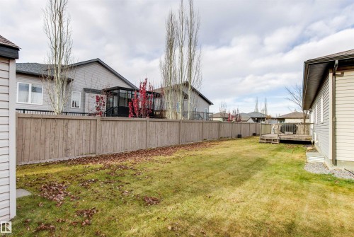View of yard with a wooden deck and a residential view - 50 Willow Wood Lane, Stony Plain, AB - Outdoor