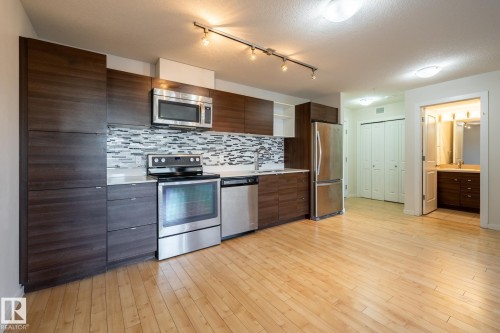 108 9523 160 Avenue, Edmonton, AB - Indoor Photo Showing Kitchen With Stainless Steel Kitchen With Upgraded Kitchen