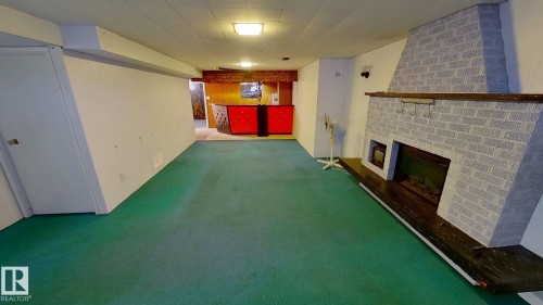 7004 93 Avenue, Edmonton, AB - Indoor Photo Showing Other Room With Fireplace