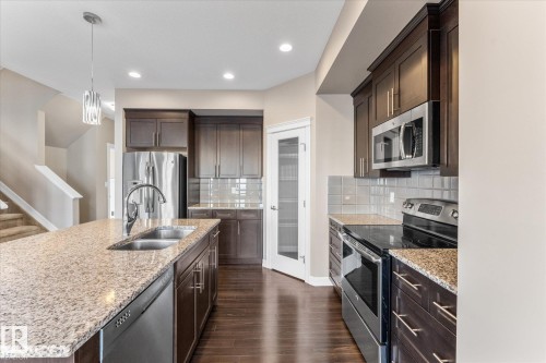 164 Sturtz Bend, Leduc, AB - Indoor Photo Showing Kitchen With Double Sink With Upgraded Kitchen
