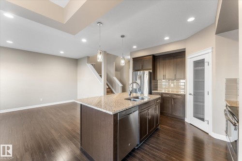 164 Sturtz Bend, Leduc, AB - Indoor Photo Showing Kitchen With Double Sink With Upgraded Kitchen