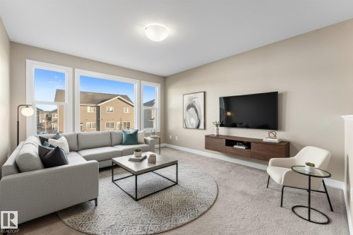 164 Sturtz Bend, Leduc, AB - Indoor Photo Showing Living Room