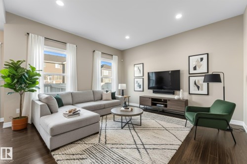 164 Sturtz Bend, Leduc, AB - Indoor Photo Showing Living Room