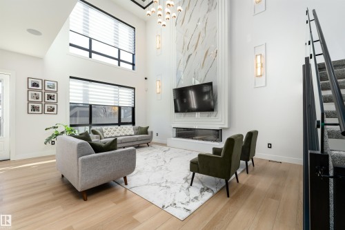 16511 8 Street, Edmonton, AB - Indoor Photo Showing Living Room With Fireplace