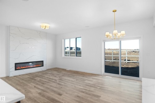 12 Axelwood Crescent, Spruce Grove, AB - Indoor With Fireplace