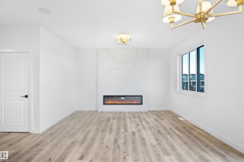 12 Axelwood Crescent, Spruce Grove, AB - Indoor With Fireplace