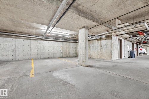 402 6070 Schonsee Way, Edmonton, AB - Indoor Photo Showing Garage