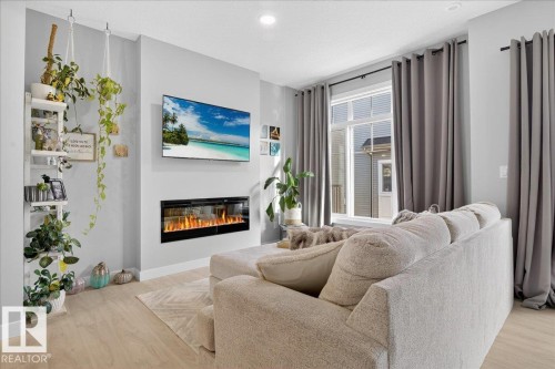 12 6214 Cartmell Court, Edmonton, AB - Indoor Photo Showing Living Room With Fireplace