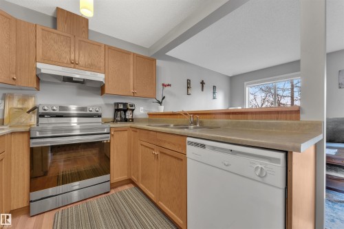 53 14603 Miller Boulevard, Edmonton, AB - Indoor Photo Showing Kitchen With Double Sink