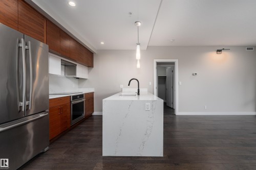 204 11710 87 Avenue, Edmonton, AB - Indoor Photo Showing Kitchen With Stainless Steel Kitchen