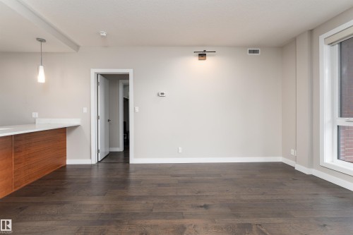 204 11710 87 Avenue, Edmonton, AB - Indoor Photo Showing Other Room With Fireplace