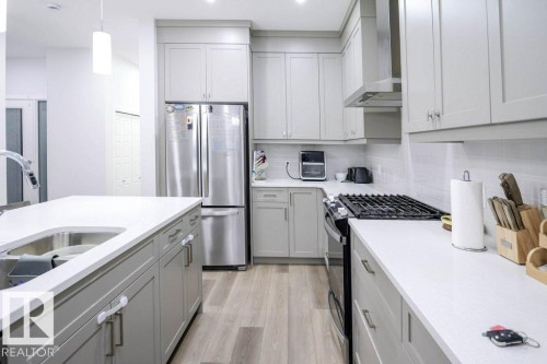 129 Paisley Gate Gate, Edmonton, AB - Indoor Photo Showing Kitchen With Stainless Steel Kitchen With Double Sink