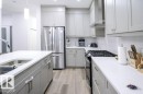 129 Paisley Gate Gate, Edmonton, AB  - Indoor Photo Showing Kitchen With Stainless Steel Kitchen With Double Sink 