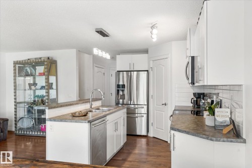 17130 7A Avenue, Edmonton, AB - Indoor Photo Showing Kitchen With Double Sink With Upgraded Kitchen