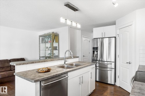 17130 7A Avenue, Edmonton, AB - Indoor Photo Showing Kitchen With Double Sink With Upgraded Kitchen