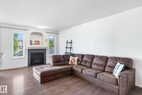 17130 7A Avenue, Edmonton, AB - Indoor Photo Showing Living Room With Fireplace