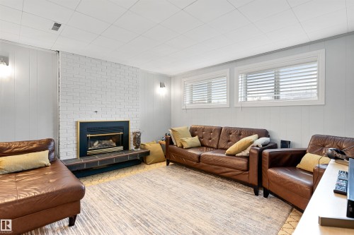 16717 109A Street, Edmonton, AB - Indoor Photo Showing Living Room With Fireplace