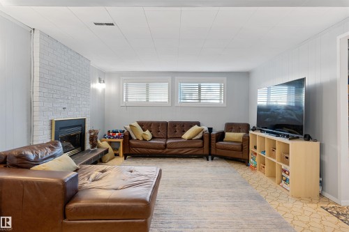 16717 109A Street, Edmonton, AB - Indoor Photo Showing Living Room With Fireplace