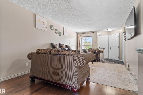 3603 23 St, Edmonton, AB - Indoor Photo Showing Living Room