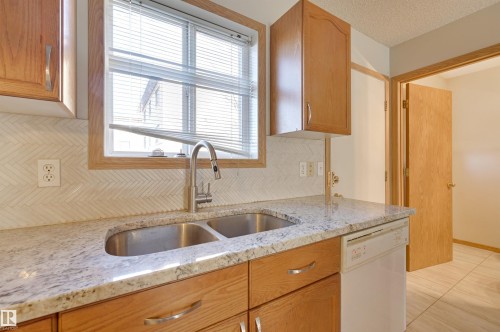 137 10909 106 Street, Edmonton, AB - Indoor Photo Showing Kitchen With Double Sink