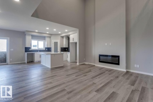 10 Chartres Close, St. Albert, AB - Indoor Photo Showing Living Room With Fireplace