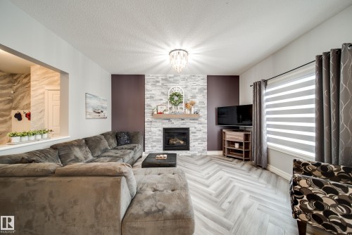 5927 6 Avenue, Edmonton, AB - Indoor Photo Showing Living Room With Fireplace