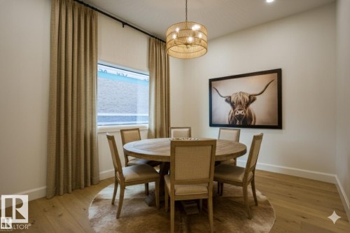 Multiple Options for this Main Floor Flex Room - Virtually Stagged to showcase a formal dinning room in the space. - 12304 39 Avenue, Edmonton, AB 