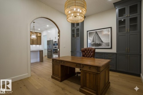 Large Main Floor Flex Room can be a Home office, Formal Dinning Area so many Options - Virtually Stagged with AI to show a possible Set Up - 12304 39 Avenue, Edmonton, AB 