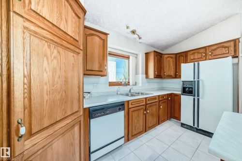 16135 56 Street, Edmonton, AB - Indoor Photo Showing Kitchen With Double Sink