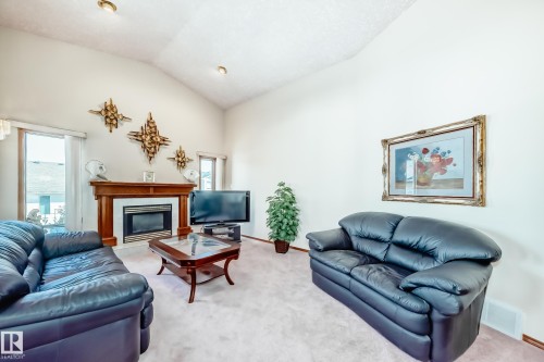 16135 56 Street, Edmonton, AB - Indoor Photo Showing Living Room With Fireplace