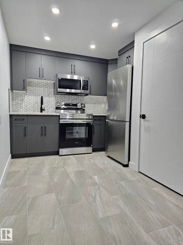 Edmonton, AB - Indoor Photo Showing Kitchen With Upgraded Kitchen