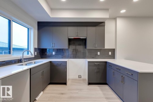 120 Garneau Gate, Spruce Grove, AB - Indoor Photo Showing Kitchen With Double Sink